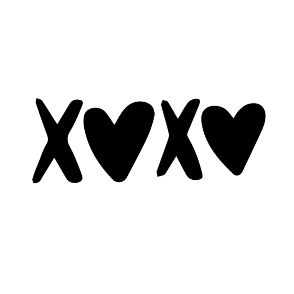 Precut glass shape of XOXO in black.