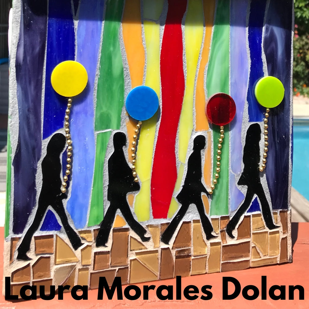 Precut glass shape of The Beatles in an art piece by Laura Morales Dolan.