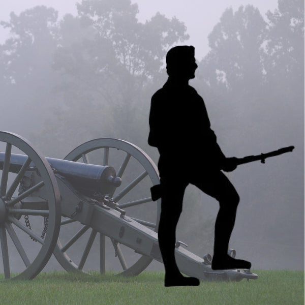 Oceanside COE 96 Glass Precut silhouette of a Revolutionary War Minuteman holding a musket in front of an old cannon in a grassy field, with dry golden grass in the background.