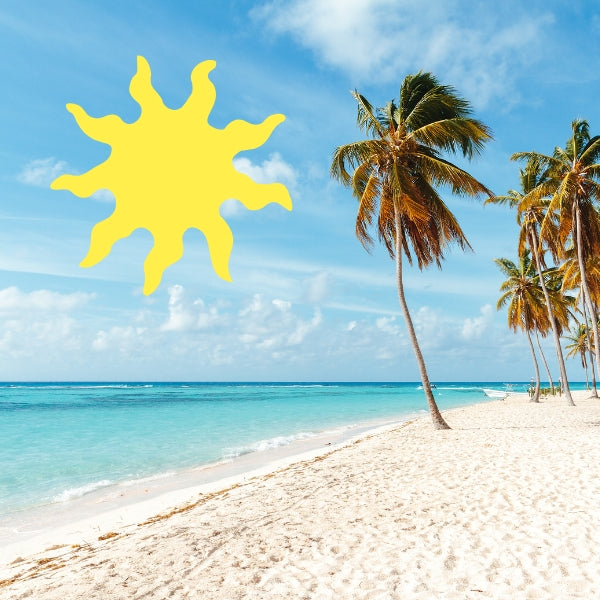 Yellow 9-ray sun precut glass shape in COE 90 Bullseye, displayed against a tropical beach background with palm trees and ocean scenery.